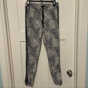 Betsy Johnson size small leopard print joggers with side metallic thread stripe!